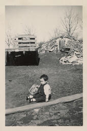 Baby Mary holding a book