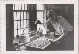 Mr. Keefer building organ components