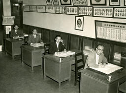 [Teachers at work in the office]