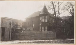 Exterior photo of house and wooden fence - Nelson & Burrard Street