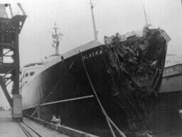 Alaska in harbour showing bow damage [graphic materials]