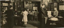 [Teachers and students in the library]