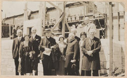 Group photo outside of church construction site