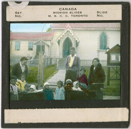 People in Front of a Church in Alert Bay