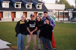 SJC Residents pose in yard