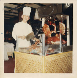 Chef with Barbequed Meats