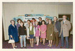 Group gathered in front of Studio Theatre 1970 Academy Award Contest poster display