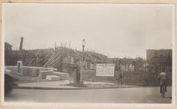 Exterior photo of church construction with sign