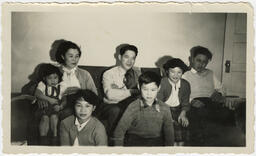 The family gather in the living room