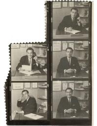 Syd Freedman posing at his desk