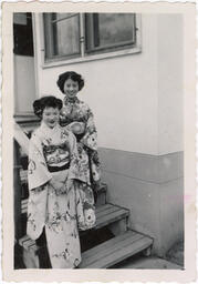 Mary and her friend, May, dressed in kimonos