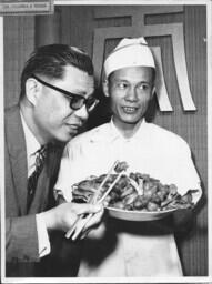 Victor Louie Sampling Chef's Dish