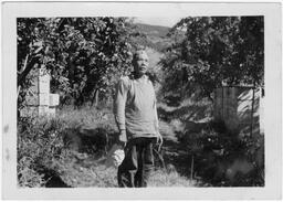 Masaichi looks on in the Uyeyama orchard