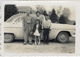 Hisae and her father pose with the kids