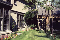 Green College exterior and flowerbeds